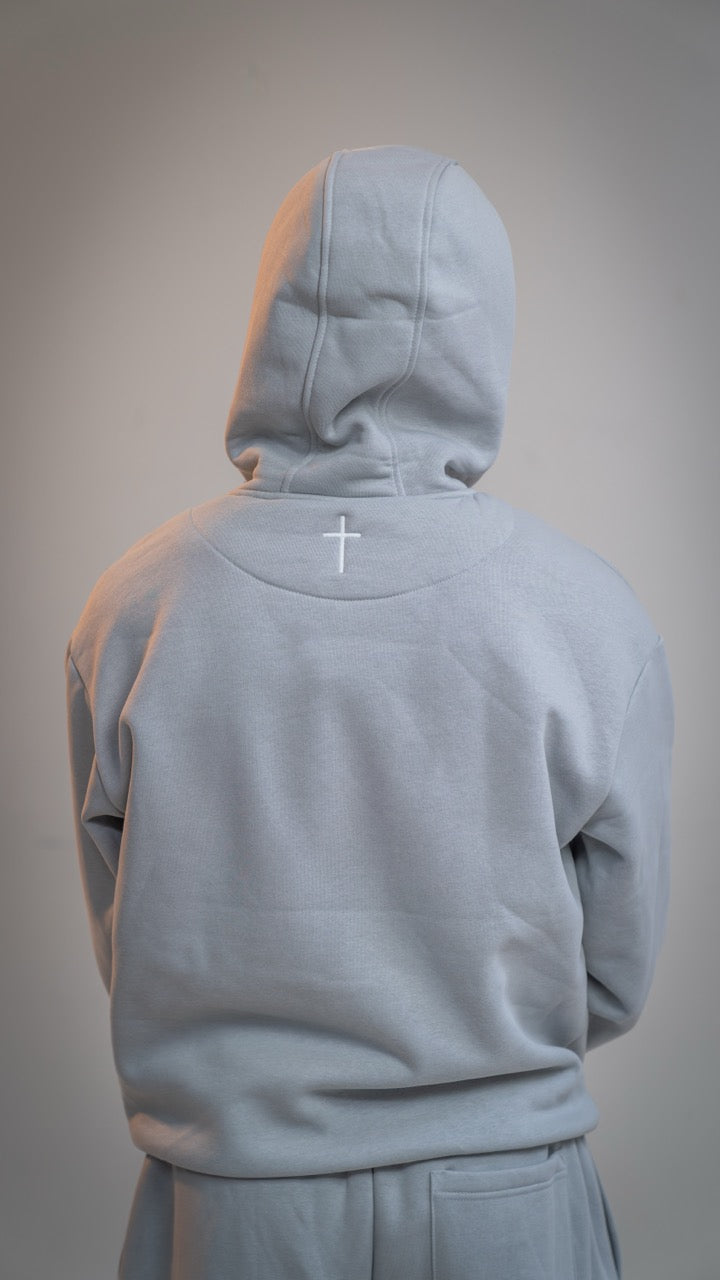 Christliches Sweatshirt oversized - Essential Hoodie Petrus bestickt mit leuchtendem Kreuz 
