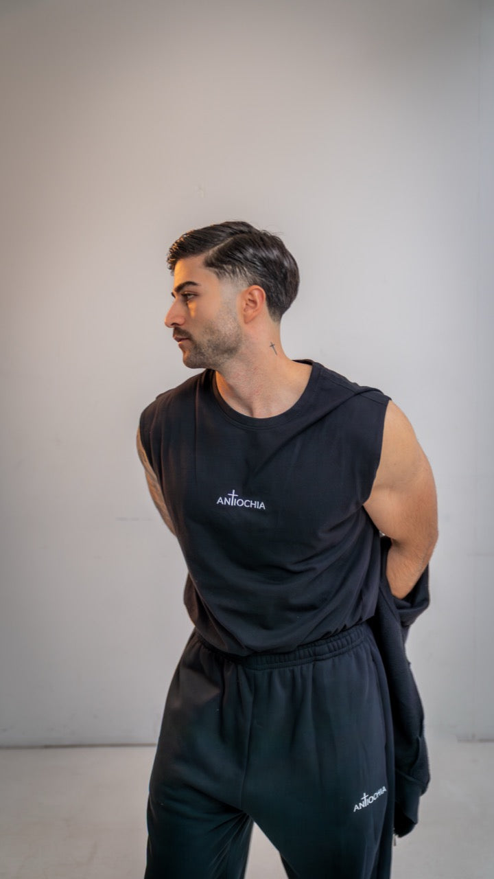 Essential Tank-Top Philippus Trageansicht - Schwarzes christliches Tank-Top mit leuchtendem Markenzeichen