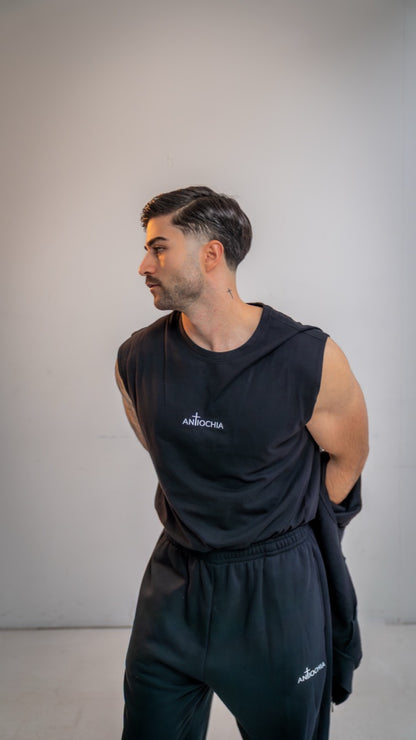 Essential Tank-Top Philippus Trageansicht - Schwarzes christliches Tank-Top mit leuchtendem Markenzeichen