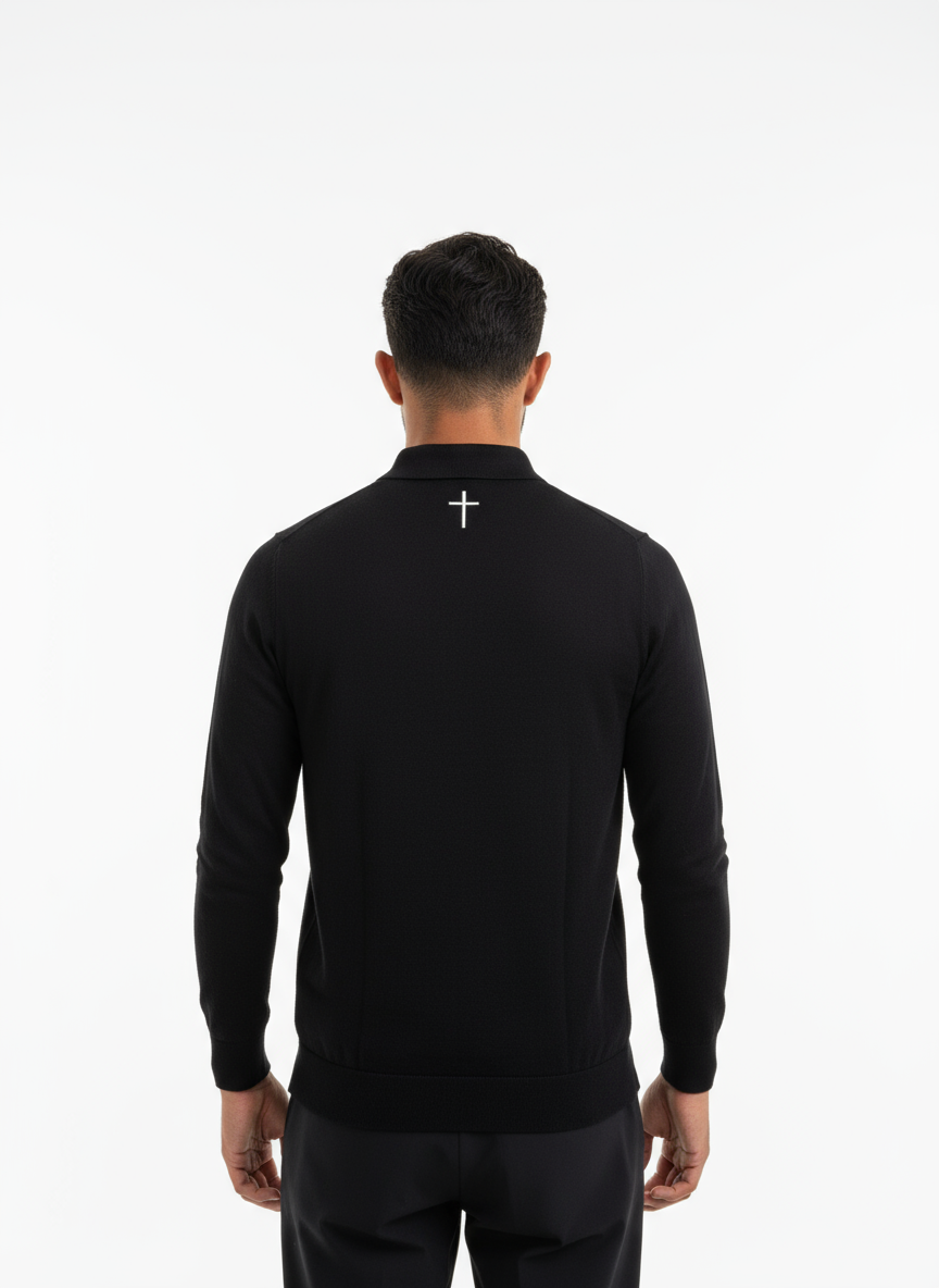 Detailansicht Merino Poloshirt Oberteil mit ANTIOCHIA Kreuz-Stickerei