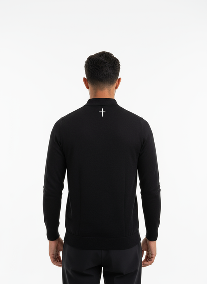 Detailansicht Merino Poloshirt Oberteil mit ANTIOCHIA Kreuz-Stickerei